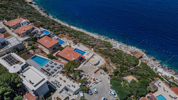 Villas With Infinity Pools Over Blue Lagoons